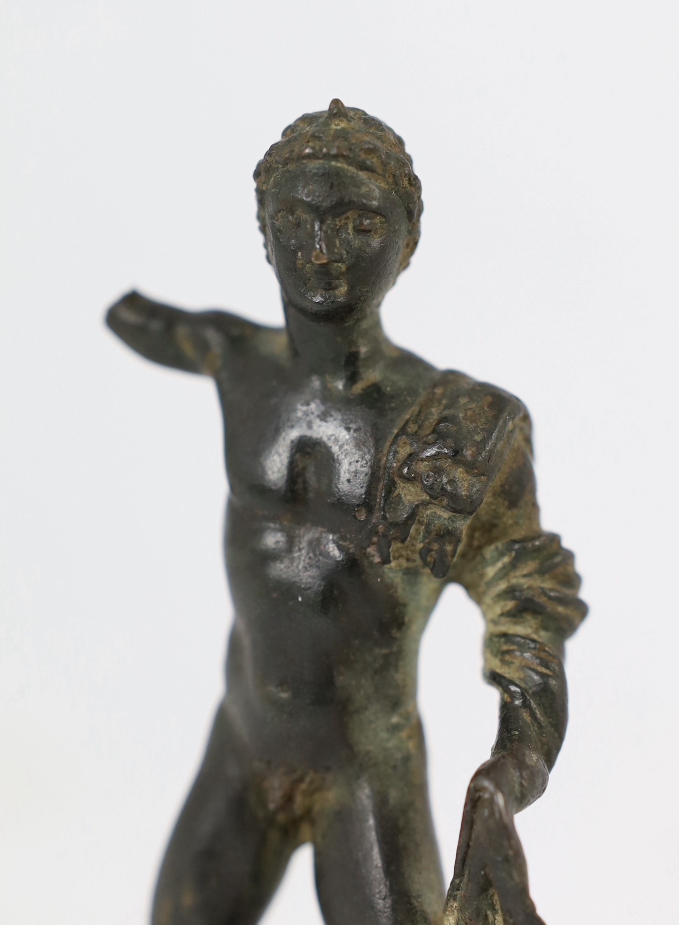 A small Roman bronze figure of Hercules, 1st century AD, 14.5cm high including later plinth